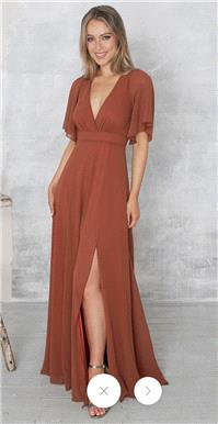 Attire. https://www.folkster.com/collections/short-and-long-sleeve-dresses/products/nyla-gown-rust