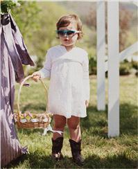 This flower girl shows us that sunglasses aren't just for grown ups. The tots in your bridal party c