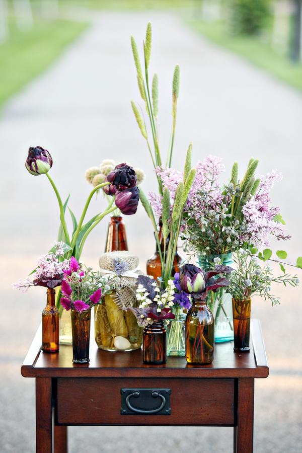 Nice touches, Flowers arranged in lots of different bottles