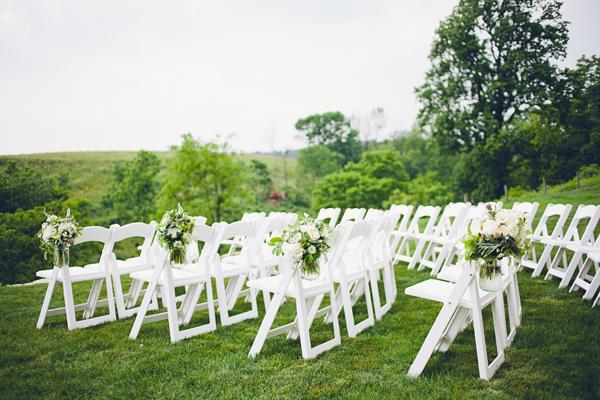 Outdoor Wedding, Lovely flowers and white chairs