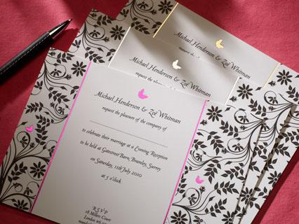 Stationary Package 1, An elegant gatefold invitation with the silver raised monogram on the front co